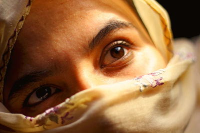 Close-up of girl wearing scarf