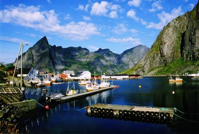 Boats moored at harbor