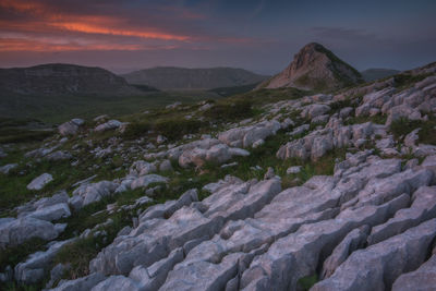 Scenic view of mountains against sky during sunset