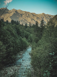 Scenic view of landscape and mountains against sky