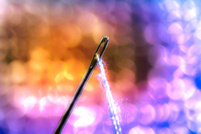 Macro shot of thread in needle