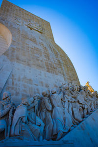 Low angle view of statue against sky