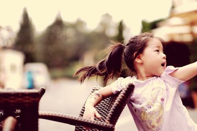 Girl looking away outdoors