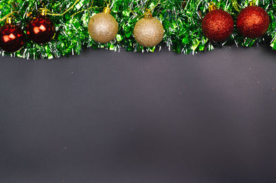 Close-up of christmas decoration against black background