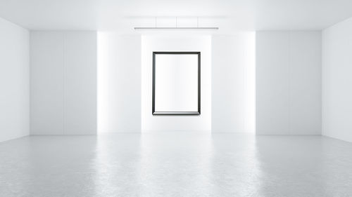 Blank frames on wall in modern room