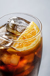 Close-up of drink against white background