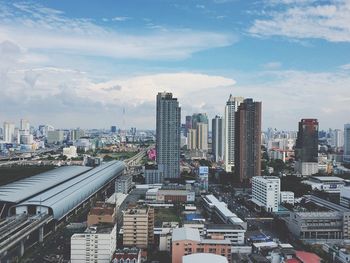 Buildings in city against sky