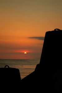 Scenic view of sea at sunset