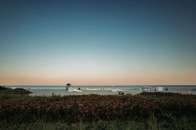 Scenic view of sea against clear sky