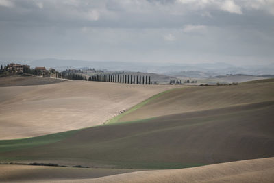 Scenic view of land against sky