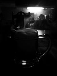 Close-up of coffee cup on table