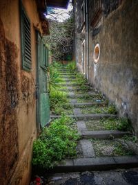 View of stairs along abandoned building