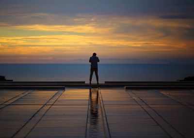 Scenic view of sea at sunset