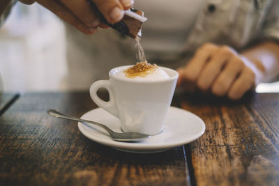 Close-up of coffee cup on table