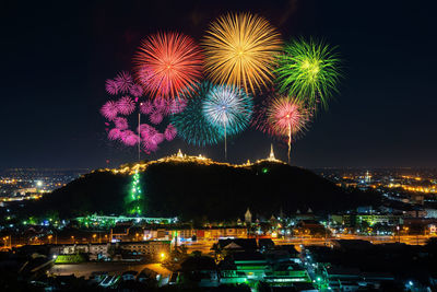 Firework display at night