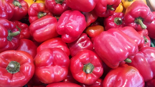 Full frame shot of red bell peppers at market