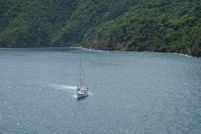 High angle view of sailboat sailing on sea