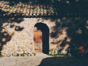 Shadow of old building on wall