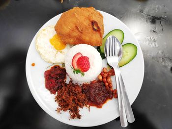 High angle view of meal served in plate on table