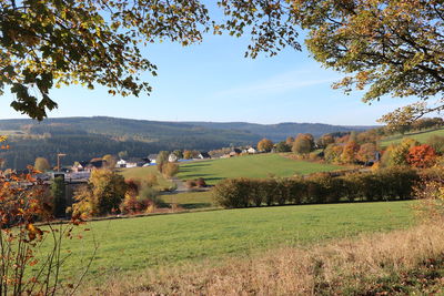 Scenic view of landscape against sky during autumn