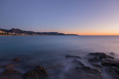 Scenic view of sea against clear sky