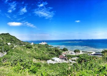 Scenic view of sea against blue sky