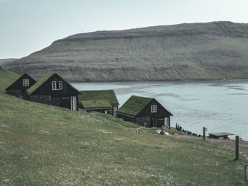 House on field against sky