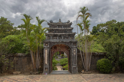 View of historical building against cloudy sky