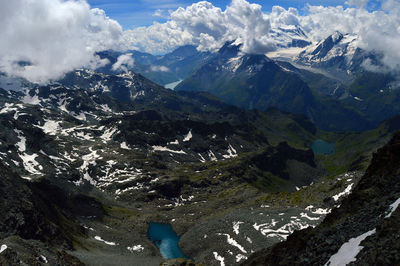 Aerial view of landscape and mountains against sky