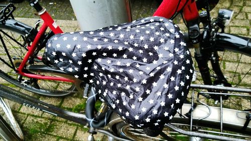 Close-up of bicycle parked in basket