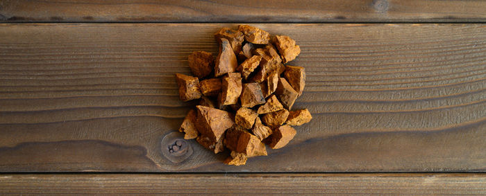 High angle view of dry leaf on table