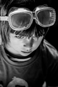 Close-up portrait of boy wearing sunglasses