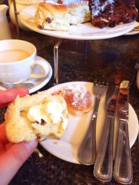 Close-up of hand holding food