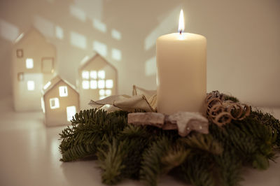 Close-up of illuminated christmas tree at home