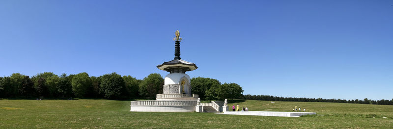 View of bell tower against blue sky