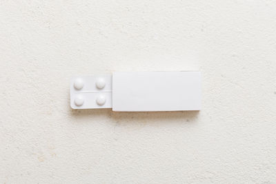 Close-up of usb stick on wall