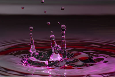 Close-up of drop splashing in water