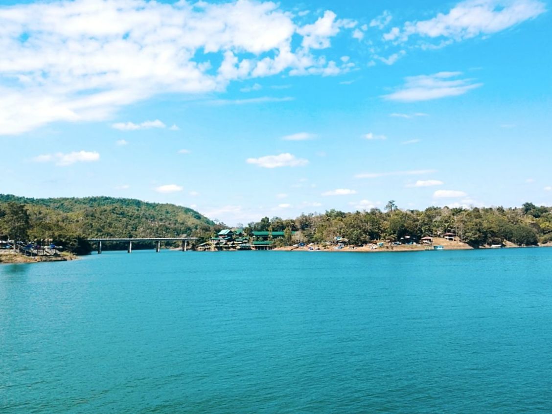 water, waterfront, sky, sea, cloud - sky, beauty in nature, architecture, scenics - nature, tree, plant, built structure, nature, tranquil scene, day, tranquility, building exterior, blue, no people, building, outdoors, turquoise colored