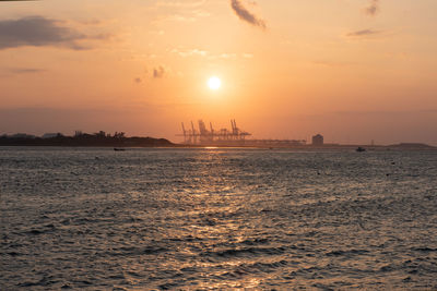 Scenic view of sea against sky during sunset