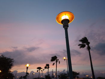 Lamp sunset palms in puerto rico la guancha ponce multicolor sky clouds