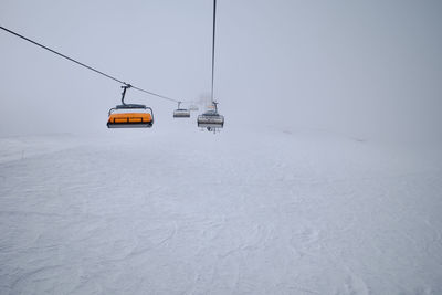 Ski lift on zugspitze, the only glacier ski area in germany. it was a cloudy and foggy day.