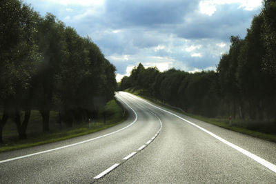 Road passing through trees