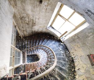 High angle view of spiral staircase in old building