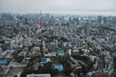 High angle view of buildings in city against sky