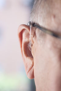 Close-up of man wearing eyeglasses