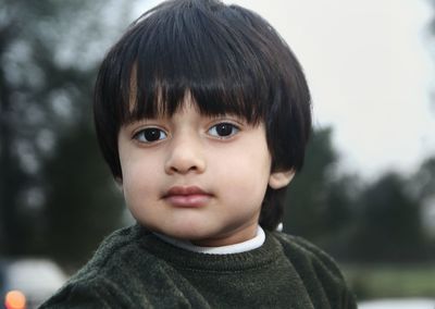 Portrait of cute boy outdoors