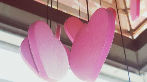 Close-up of pink heart shaped balloons