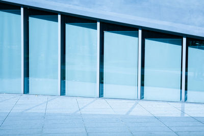 Reflection of building on glass window