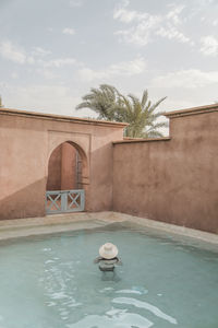 High angle view of woman swimming in pool