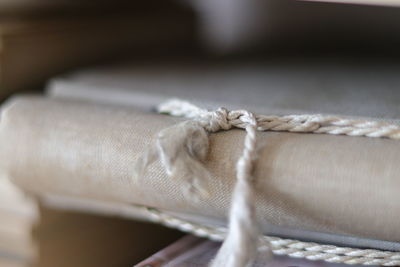 Close-up of tied up on rope